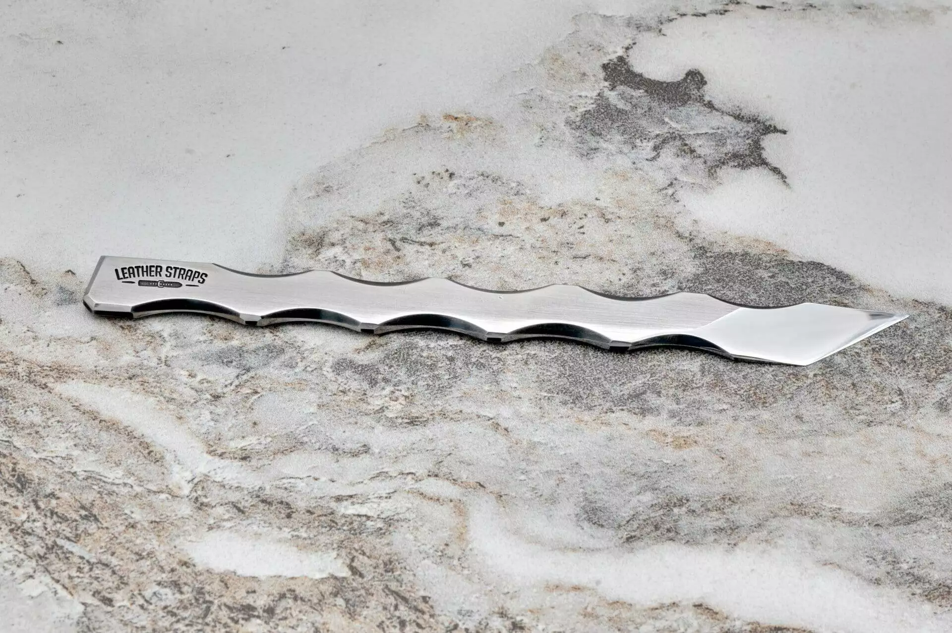 Bolt Leather Scalpel, marble surface.