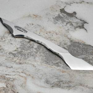 Talon Leather Knife, marble surface.