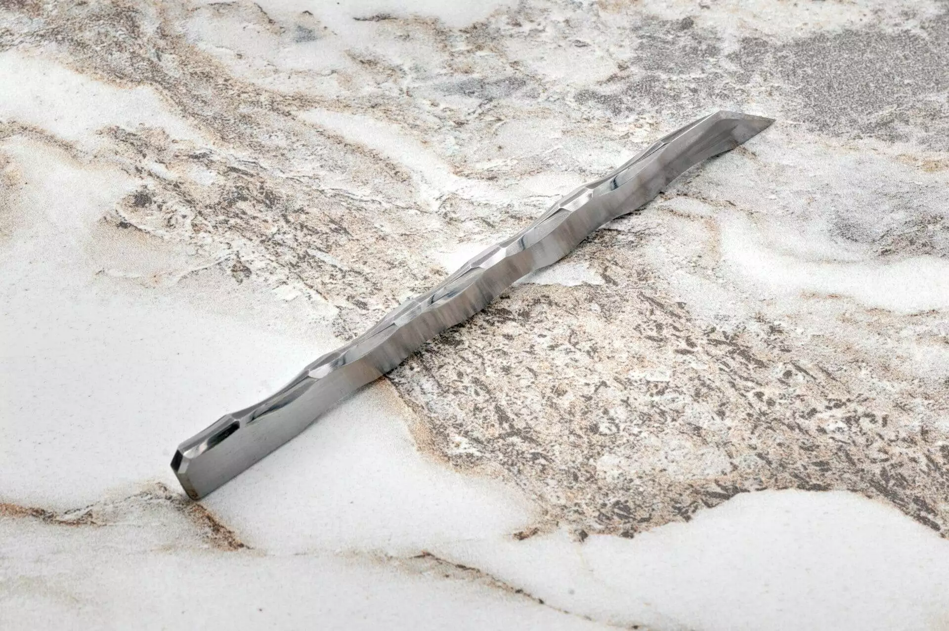 Perseus Leather Scalpel, marble surface.