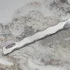 Perseus Leather Scalpel, marble surface.