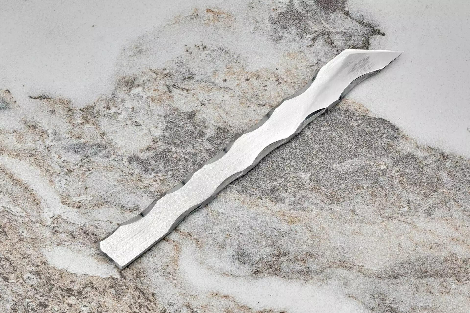 Leather Scalpel, marble surface.