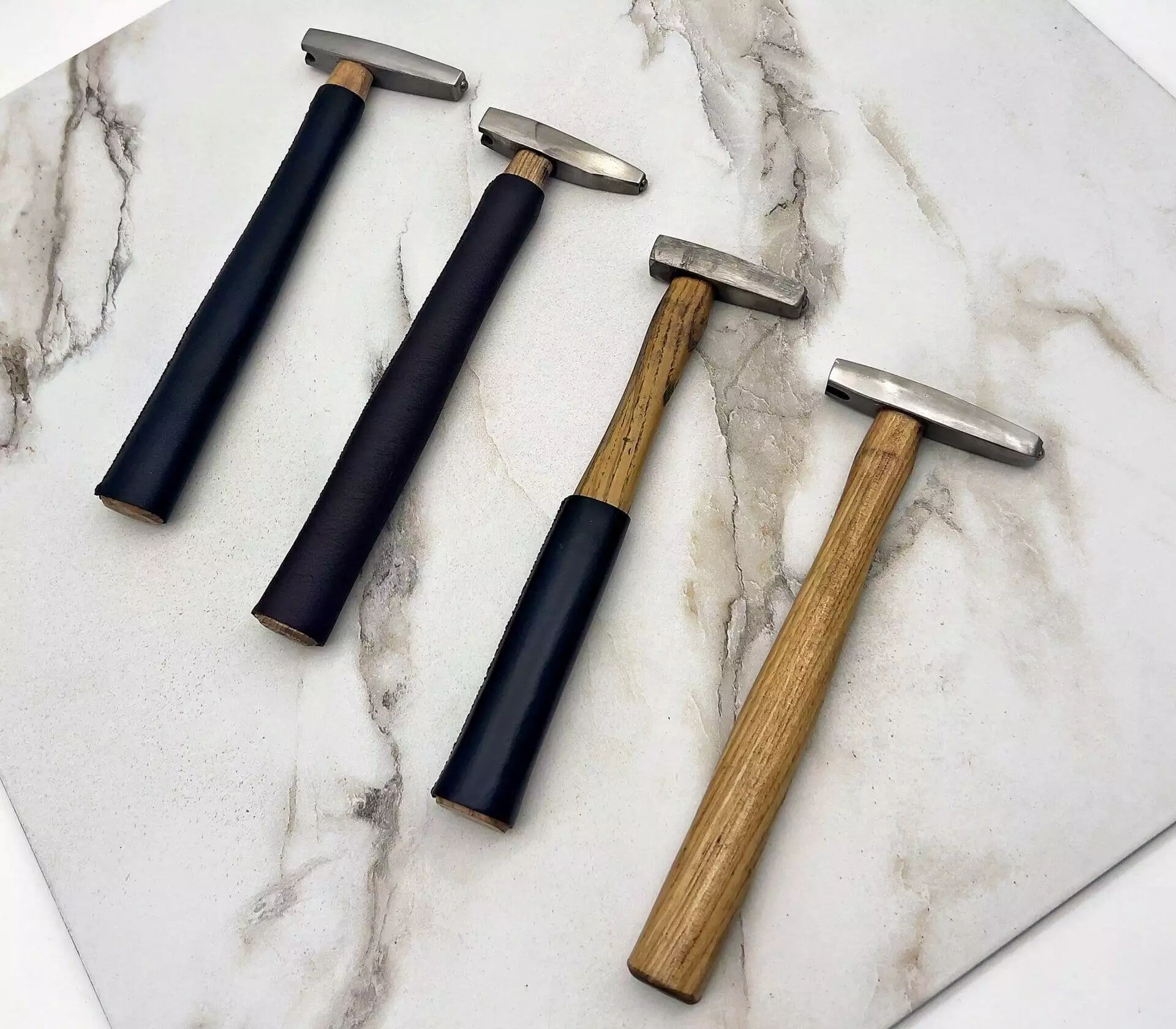 Carbide tipped hammers, marble surface.