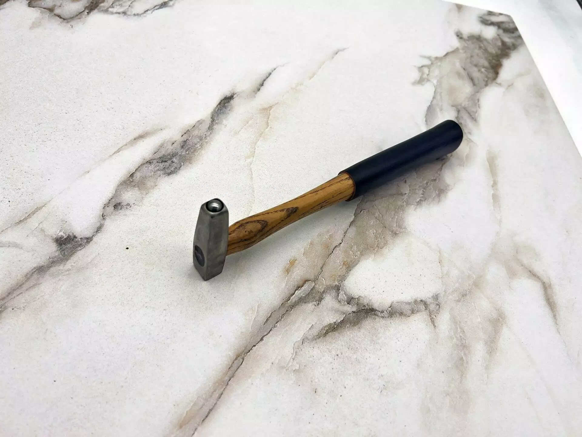 Carbide tipped, marble countertop.