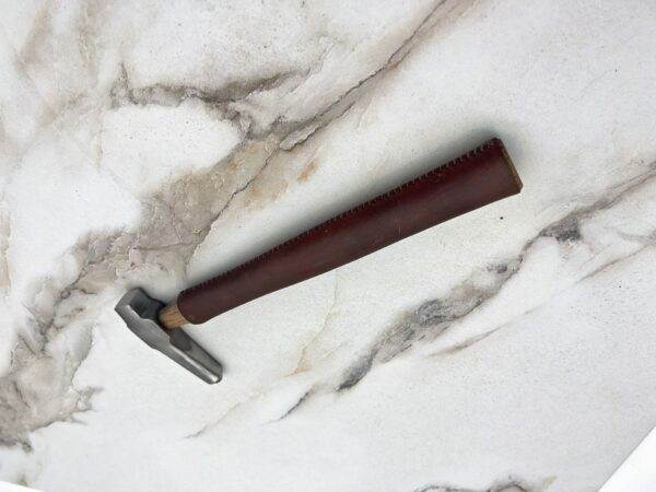 Carbide Tipped Straightening Hammer, marble table.