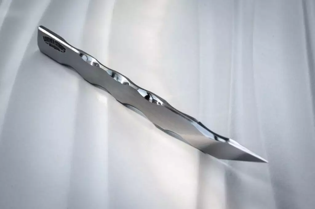 stainless steel knife, white surface