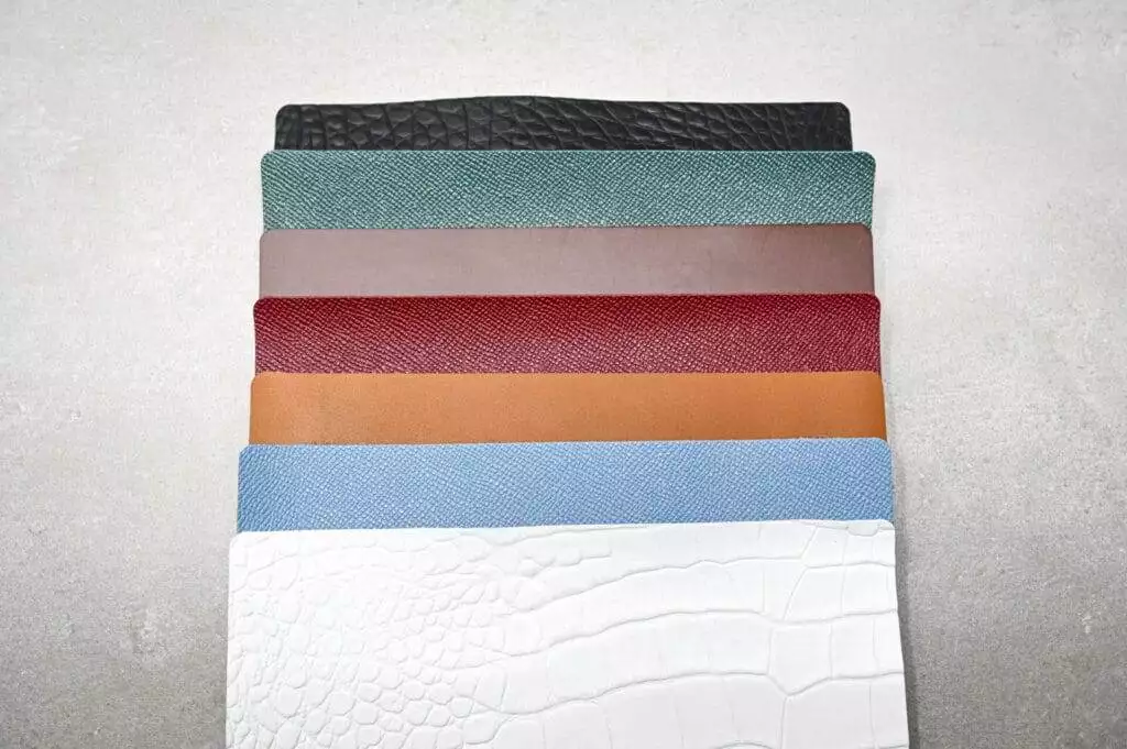 Crocodile leather wallets in a variety of colors from a Comprehensive Guide to Choosing and Using Leather for Your Craft Projects.