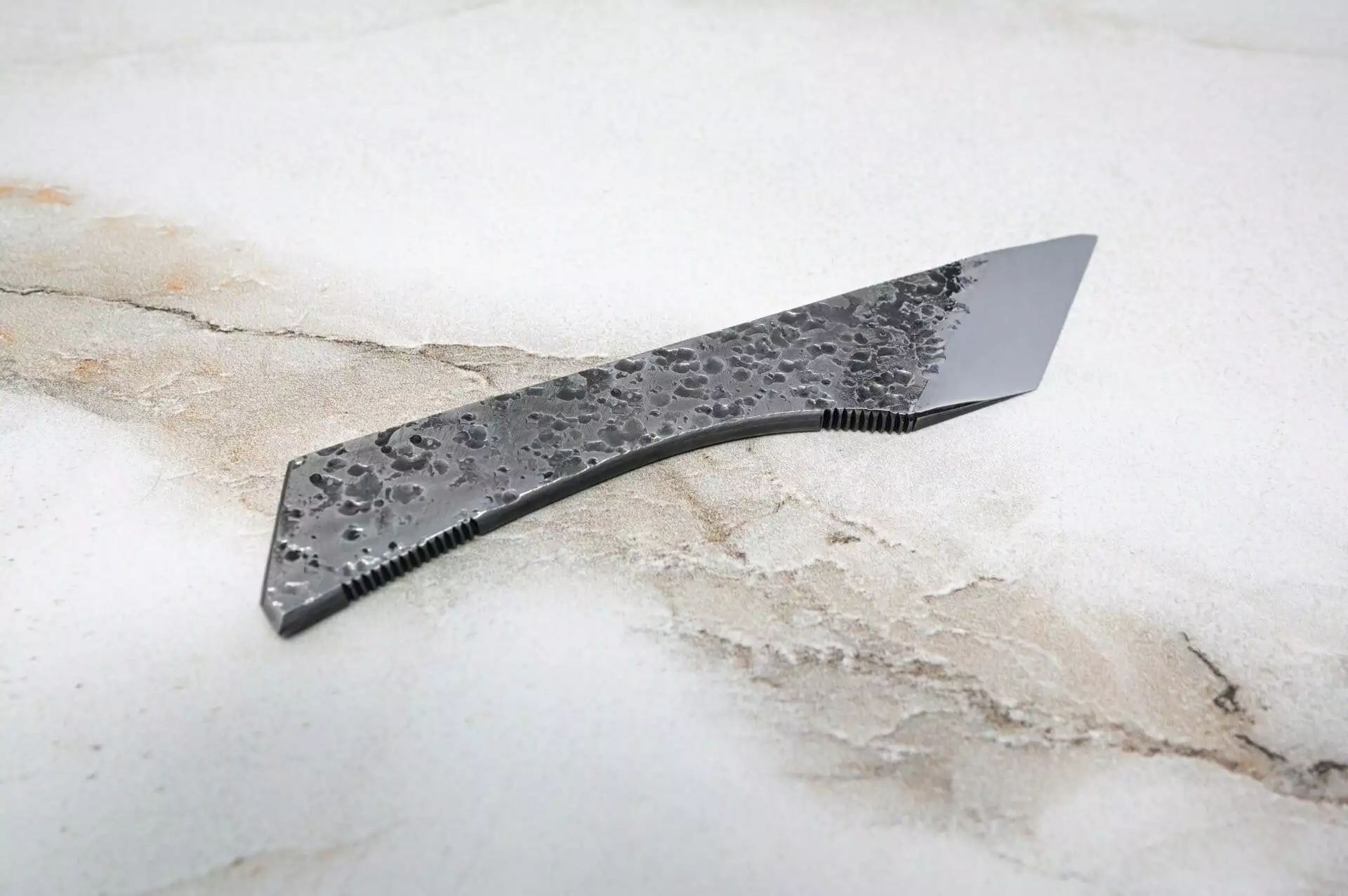 black handle, white surface, The Scorpion Skiver (45 Degree Bevel)