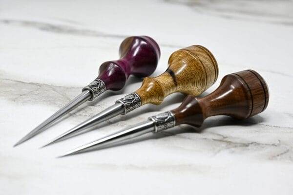 Three 3 Leathercraft Knife Holiday Special on a marble surface with a Holiday Special twist.