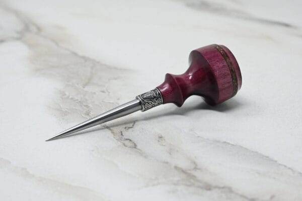 A Pre-release sale Japanese Leather Knife + Small Awl on a marble surface, available for pre-release sale.