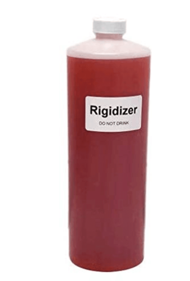 A bottle labeled "Rigidizer" with a warning "Do Not Drink," containing a red liquid.