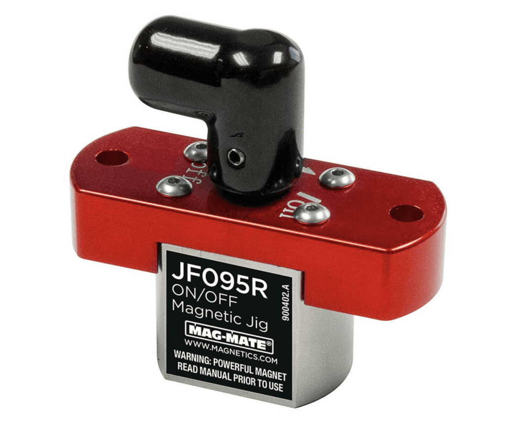 Red magnetic jig labeled "JF095R ON/OFF Magnetic Jig" with a black handle on top and a warning label about powerful magnets.