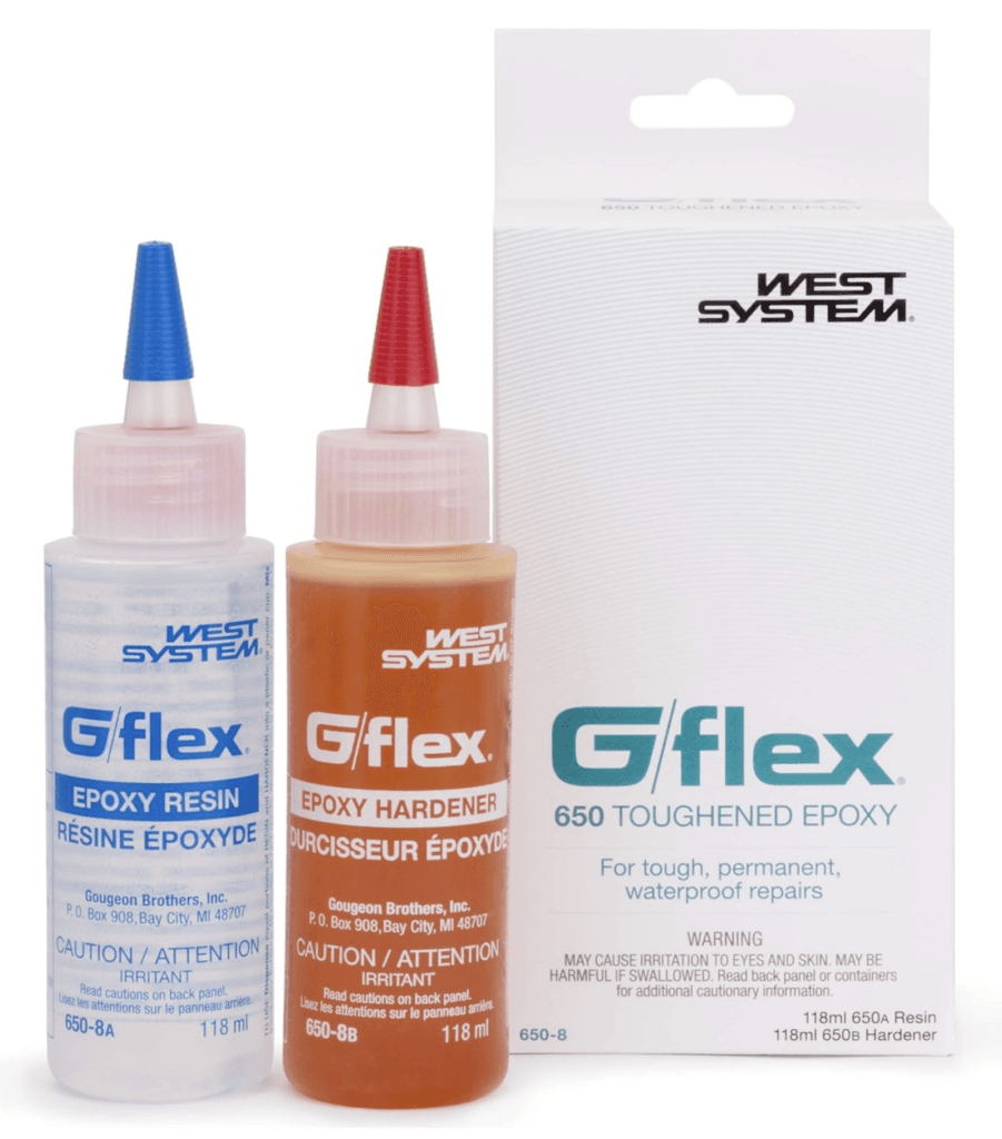 Two bottles of G/flex epoxy by West System. One is labeled epoxy resin, the other epoxy hardener. Box text says "650 toughed epoxy for tough, permanent, waterproof repairs.